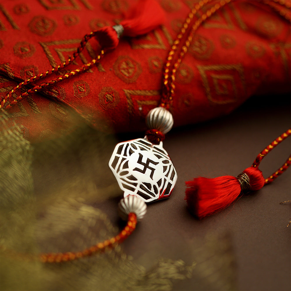 SILVER PLATED SWASTIK RAKHI