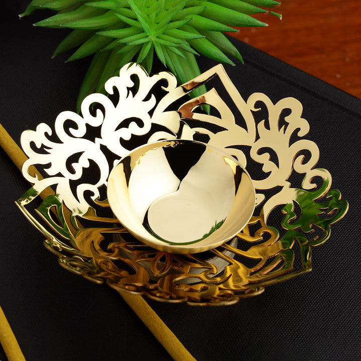 DECORATED BRASS TEA LIGHT HOLDER